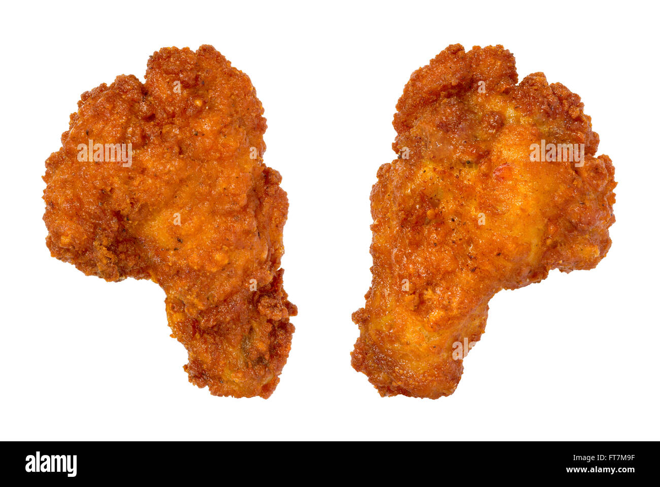 Two Buffalo Chicken Wings. This appetizer has become a popular bar food. The image is a cut out, isolated on a white background. Stock Photo