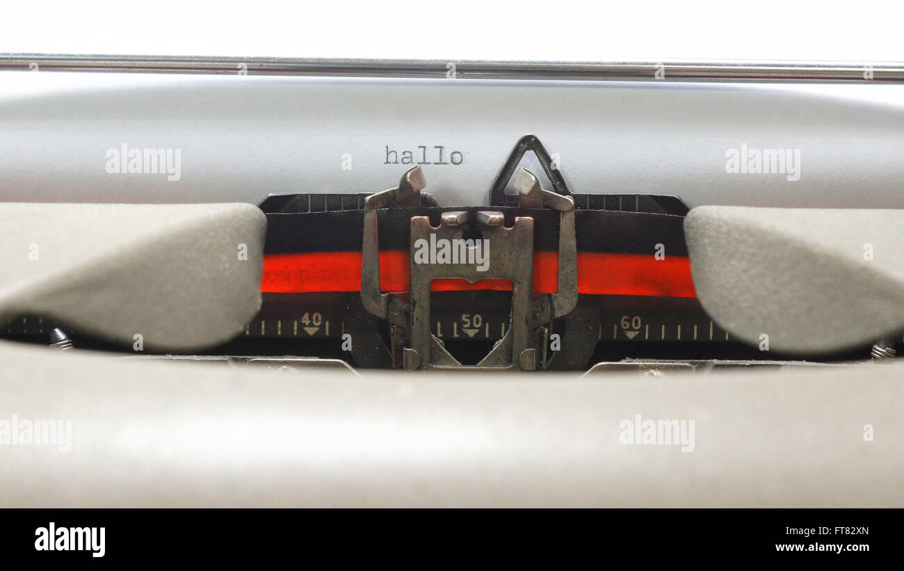 Hallo hello in german language message written on old typewriter on