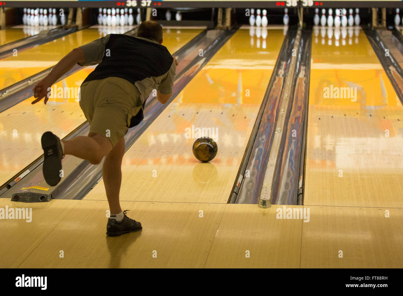 CBP Officer Lewis Seutz from the Sumas Washington Port of Entry goes for a three one split at the World Police and Fire Games Bowling Tournament in Sterling Virginia. Photo by James Tourtellotte Stock Photo