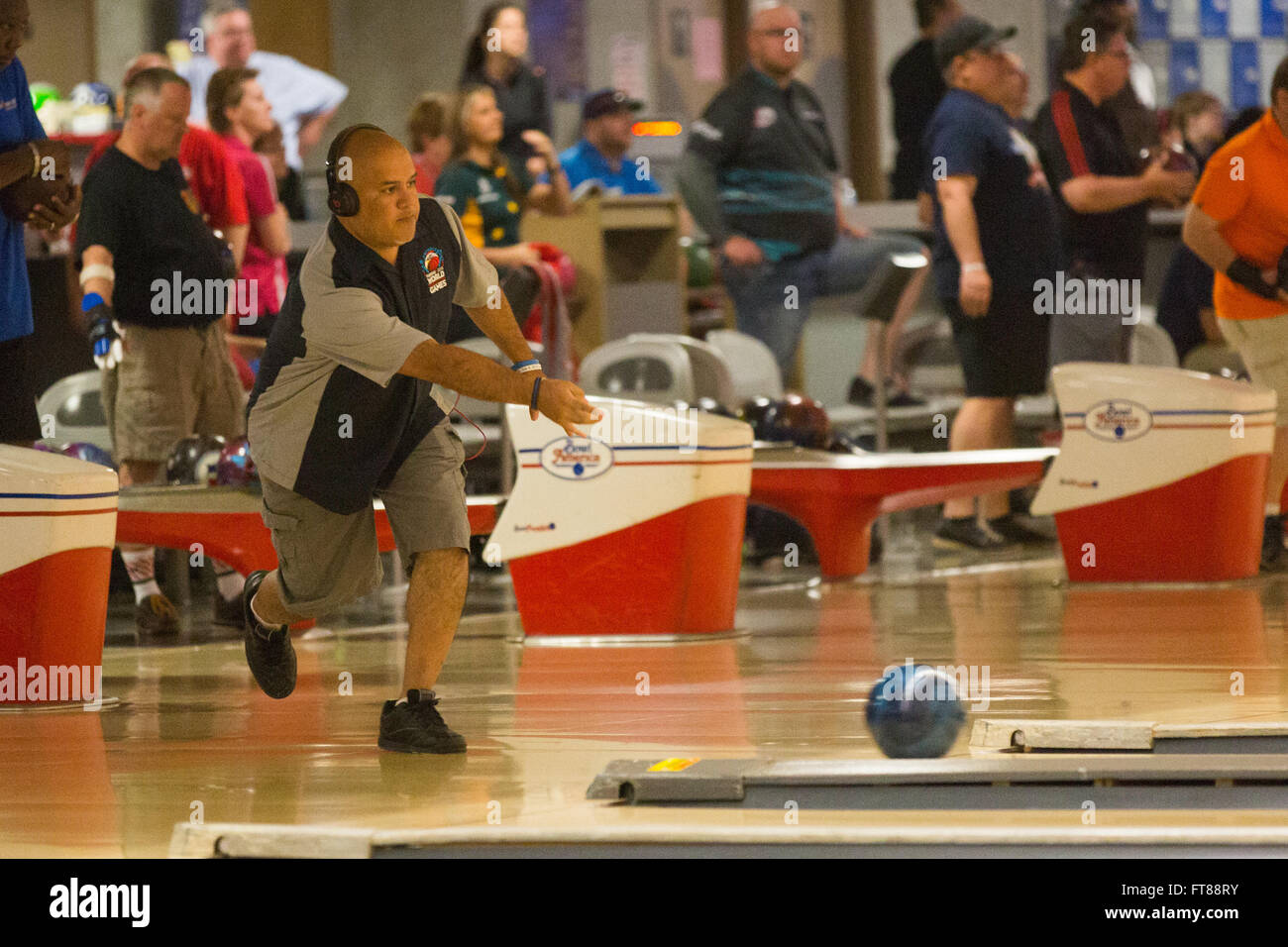 CBP Officer Hector Arredondo from the Sumas Washington Port of Entry goes for a srike at the World Police and Fire Games Bowling Tournament in Sterling Virginia. Photo by James Tourtellotte Stock Photo
