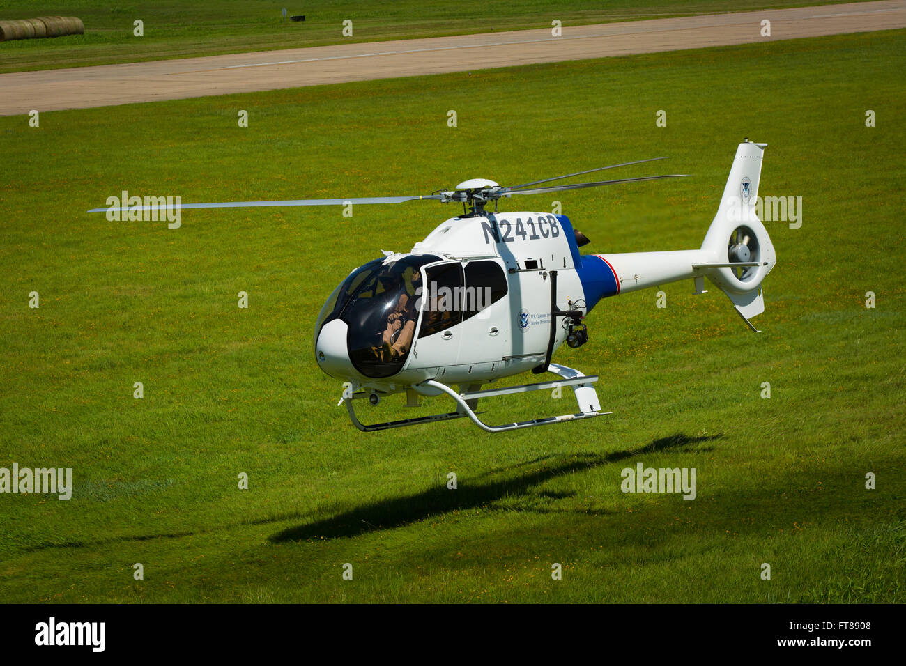 Pilots at the CBP National Air Training Center in Oklahoma City conduct training exercises with EC-120 helicopters, focusing on emergency response maneuvers. This training enhances their preparedness for various real-world situations, ensuring safety and efficiency. Stock Photo
