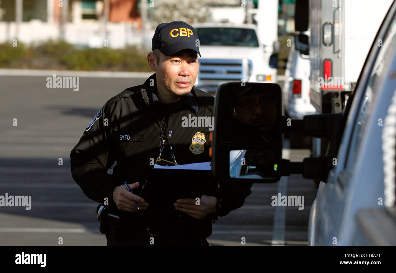 U.S. Customs And Border Protection Officer Alan Syto Instructs A Driver ...