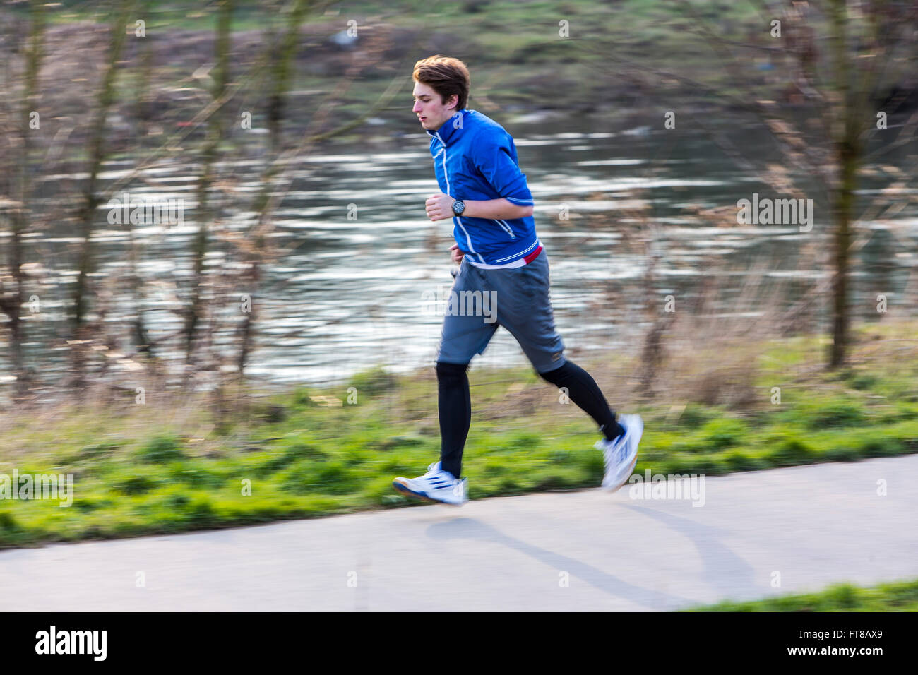 Young sports man running on hi-res stock photography and images - Alamy