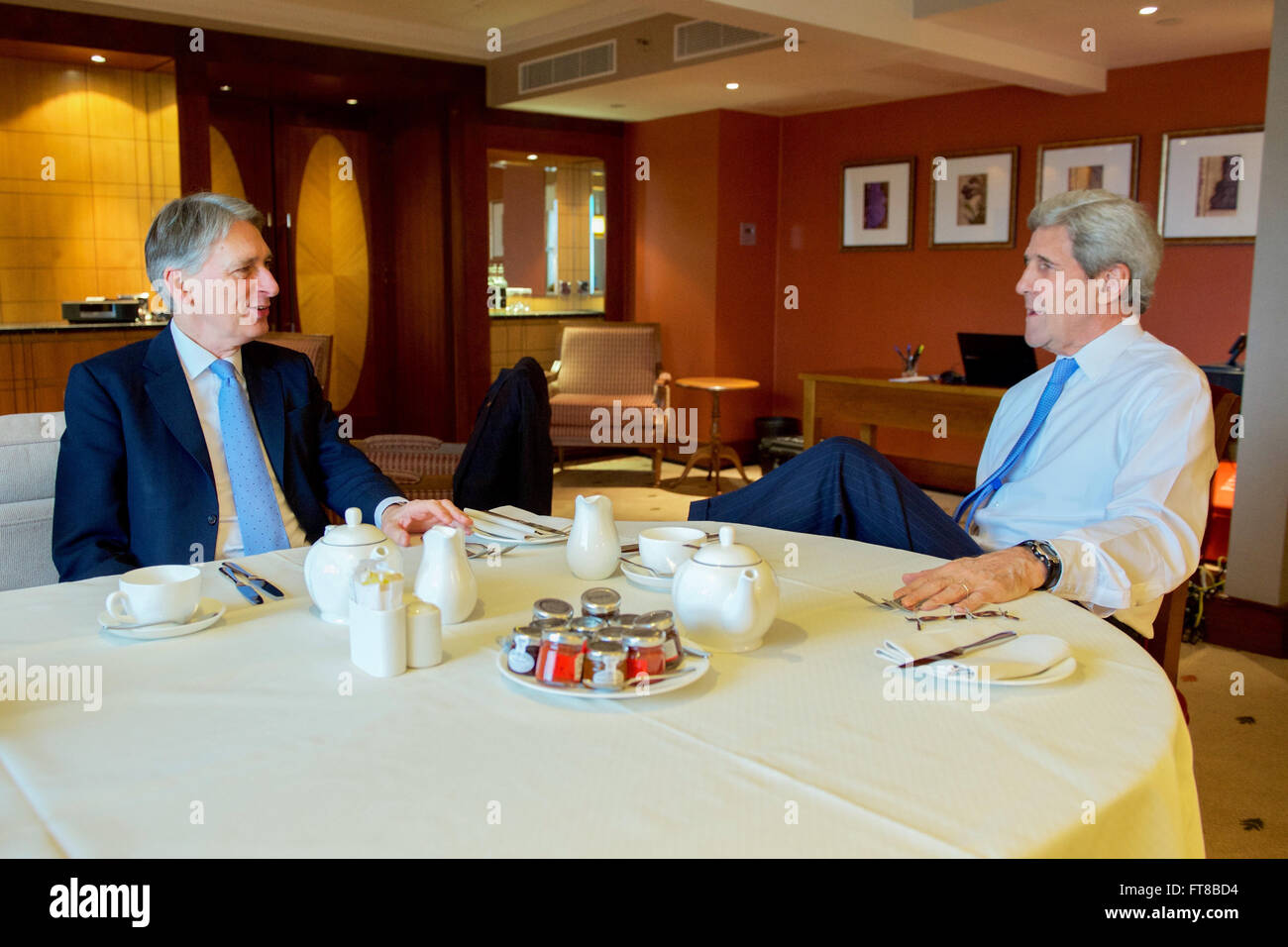U.S. Secretary of State John Kerry sits with British Foreign Secretary Philip Hammond on February 20, 2016, at the outset of a working breakfast at the Intercontinental Hotel in London, U.K. [State Department photo/ Public Domain] Stock Photo