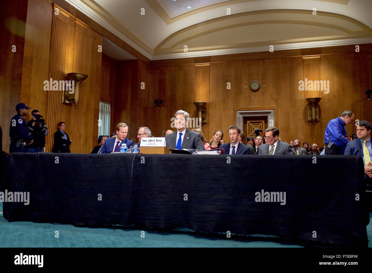 U.S. Secretary of State John Kerry listens to opening statements from the leaders of the Senate Foreign Relations Committee on February 23, 2016, during an appearance on Capitol Hill in Washington, D.C., to discuss the Obama Administration's 2017 federal budget request. [State Department photo/ Public Domain] Stock Photo