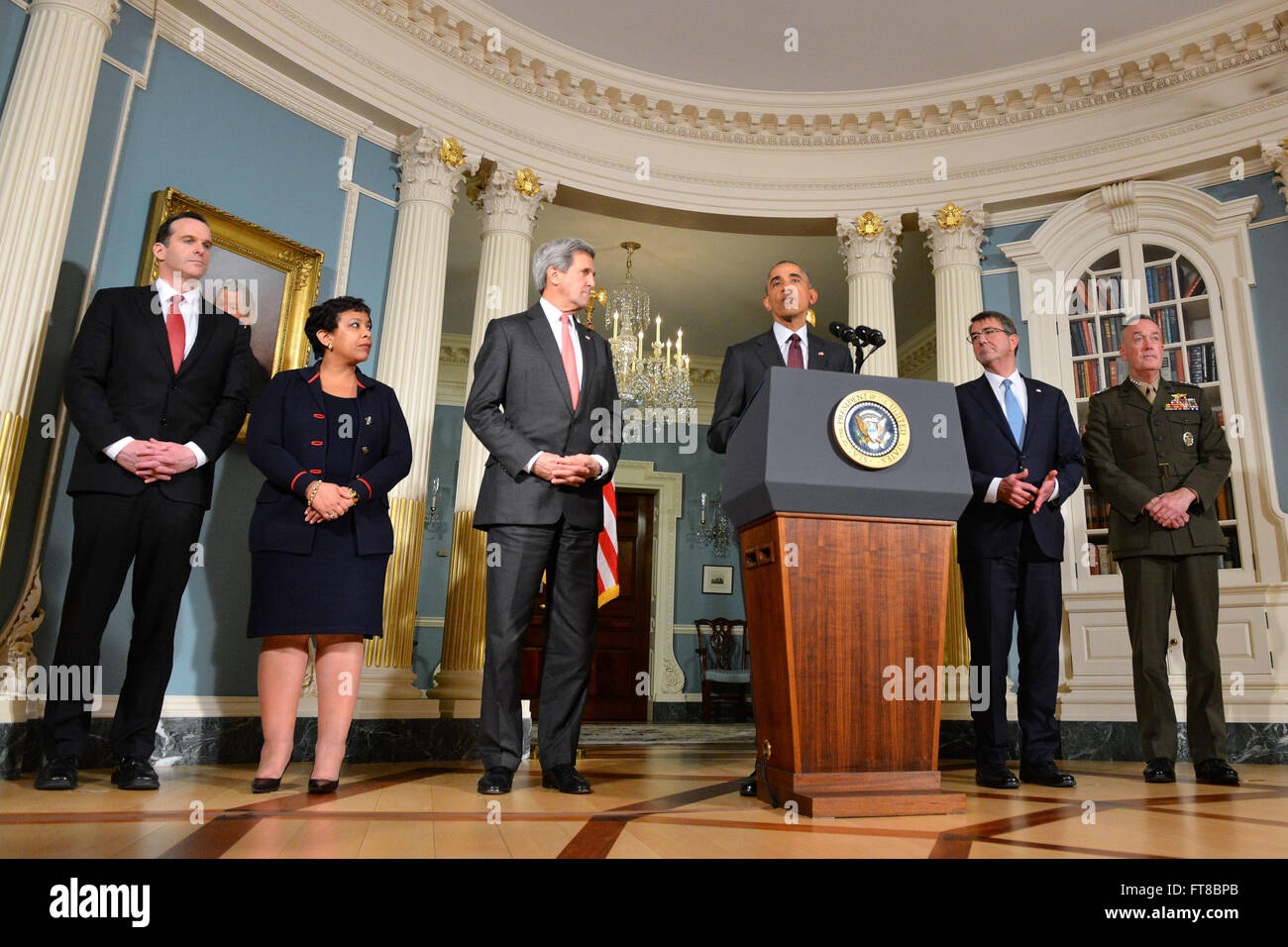 President Barack Obama, with (left to right) Special Presidential Envoy for the Global Coalition to Counter ISIL Brett McGurk, Attorney General Loretta Lynch, U.S. Secretary of State John Kerry, U.S. Secretary of Defense Ash Carter, and Chairman of the Joint Chiefs of Staff Joseph Dunford, delivers a statement on the global campaign to degrade and destroy ISIL, as well as Syria and other regional issues, at the U.S. Department of State in Washington, D.C., on February 25, 2016. [State Department photo/ Public Domain] Stock Photo