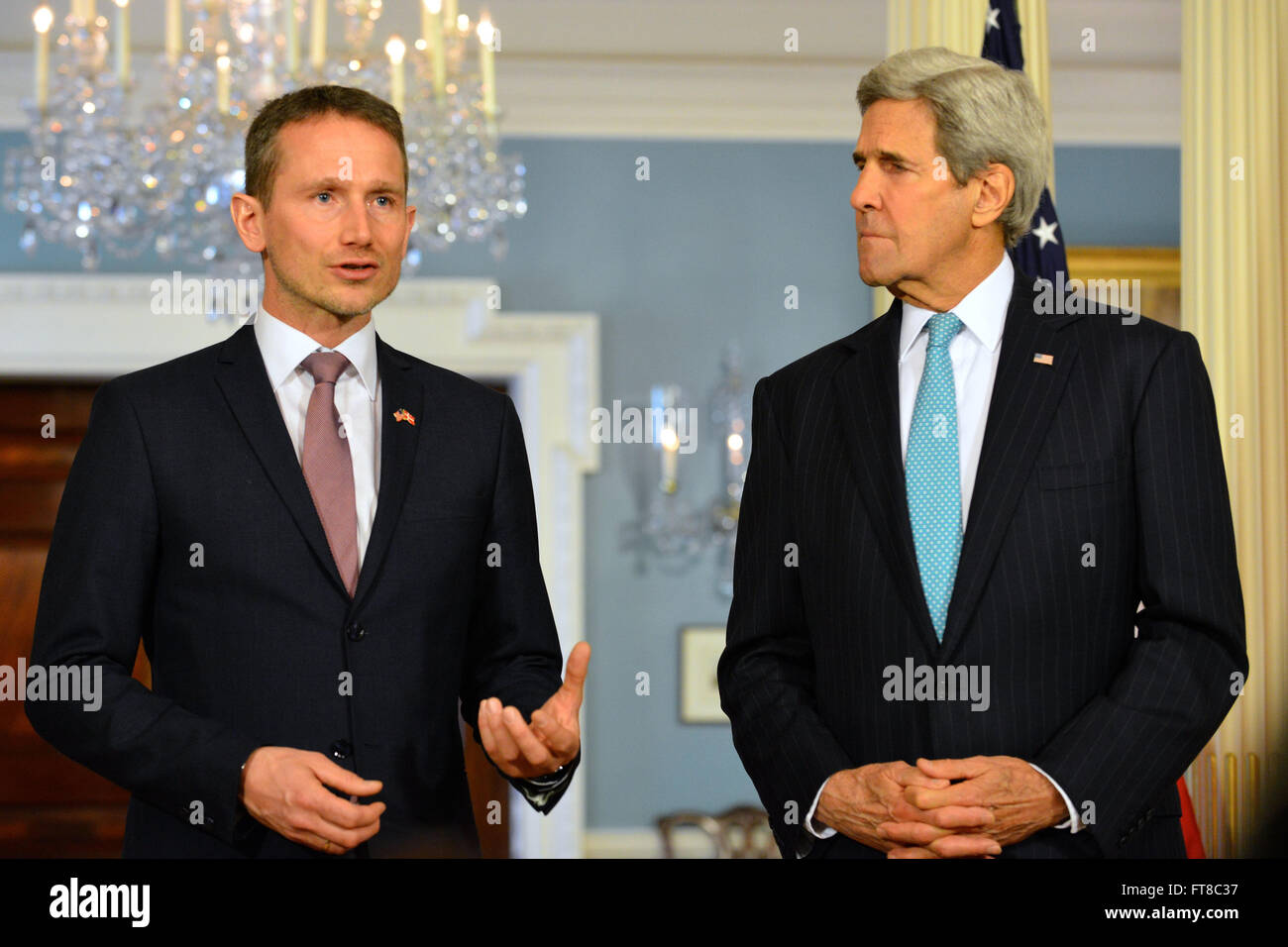 U.S. Secretary of State John Kerry listens as Danish Foreign Minister Kristian Jensen addresses reporters before their bilateral meeting at the U.S. Department of State in Washington, D.C., on March 9, 2016. [State Department photo/ Public Domain] Stock Photo