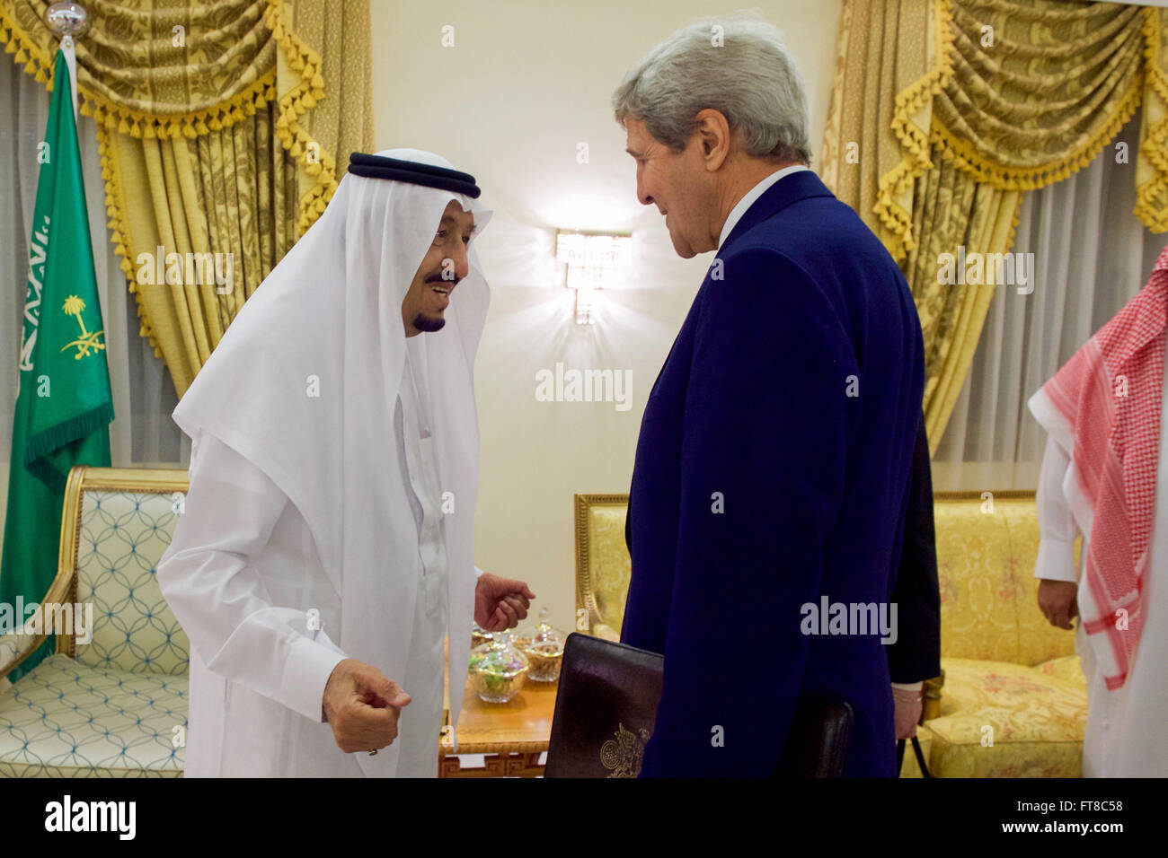 Saudi Arabia King Salman greets U.S. Secretary of State John Kerry on March 11, 2016, at King Khalid Military City outside Hafr al-Batin, Saudi Arabia, before a bilateral meeting. [State Department Photo/Public Domain] Stock Photo