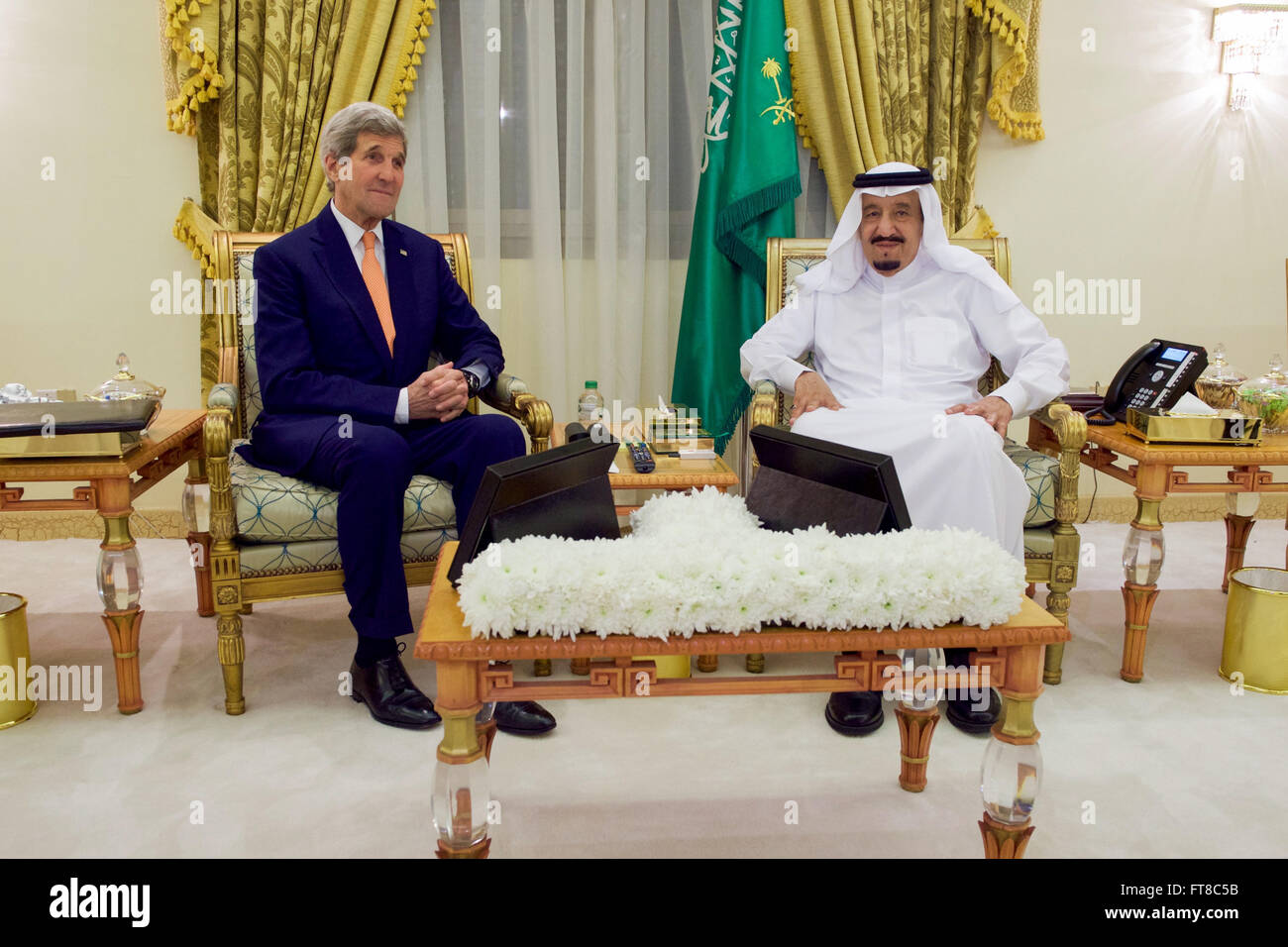 U.S. Secretary of State John Kerry sits with Saudi Arabia King Salman on March 11, 2016, at King Khalid Military City outside Hafr al-Batin, Saudi Arabia, before a bilateral meeting. [State Department Photo/Public Domain] Stock Photo