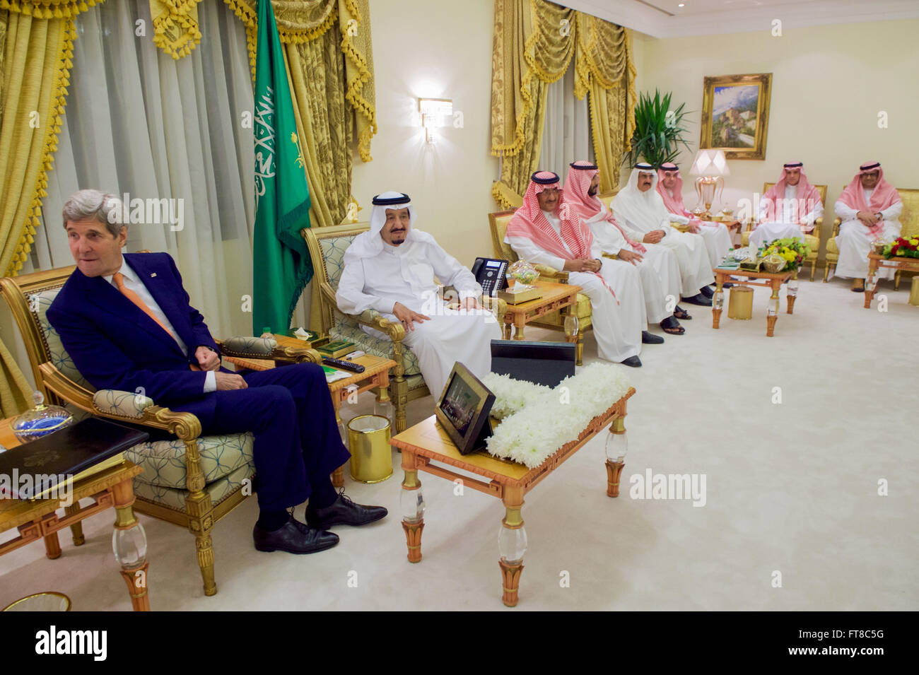 U.S. Secretary of State John Kerry sits with Saudi Arabia King Salman on March 11, 2016, at King Khalid Military City outside Hafr al-Batin, Saudi Arabia, before a bilateral meeting with the King, Crown Prince Muhammad bin Nayef, Deputy Crown Prince Mohammed bin Salman, Foreign Minister Adel al-Jubeir, and other advisers. [State Department Photo/Public Domain] Stock Photo