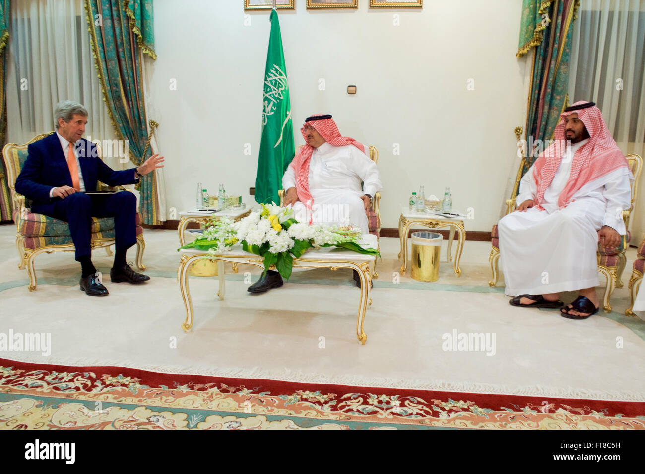 U.S. Secretary of State John Kerry sits with Saudi Arabia Crown Prince Muhammad bin Nayef and Deputy Crown Prince Mohammed bin Salman on March 11, 2016, at King Khalid Military City outside Hafr al-Batin, Saudi Arabia, before a trlateral meeting also attended by Foreign Minister Adel al-Jubeir. [State Department Photo/Public Domain] Stock Photo