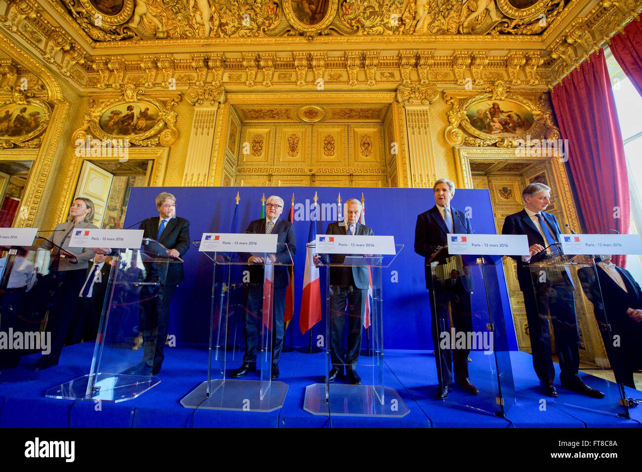 U.S. Secretary of State John Kerry stands with his counterparts on March 13, 2015, at the Quai d'Orsay in Paris, France, as he addresses reporters after they held an E4+1 meeting - including representatives of France, Germany, Italy, the United Kingdom, and European Union - focused on Syria, Libya, Yemen, Ukraine, and other foreign policy matters. [State Department Photo/Public Domain] Stock Photo