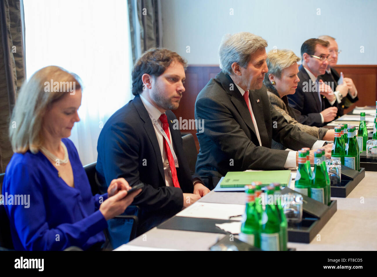 U.S. Secretary of State John Kerry - flanked by State Department Executive Assistant Lisa Kenna, State Department Chief of Staff Jon Finer, Under Secretary of State for Arms Control and International Security Rose Gottemoeller, State Department Spokesperson John Kirby, and Assistant to the Chairman of the Joint Chiefs of Staff Navy Admiral Frank Pandolfe - sits across from Republic of Korea Foreign Minister Yun Byung-Se on February 12, 2016, at The Charles Hotel in Munich, Germany, at the outset of a bilateral meeting on the margins of the Munich Security Council. [State Department photo/ Publ Stock Photo