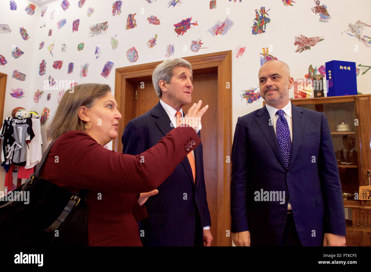 Assistant Secretary of State for European and Eurasian Affairs Toria Nuland explains, to U.S. Secretary of State John Kerry, the handpainted designs by Albanian Prime Minister Edi Rama in his private office in the Prime Ministry in Tirana, Albania, where the Secretary arrived on February 14, 2016, before they participate in a bilateral meeting. [State Department photo/ Public Domain] Stock Photo