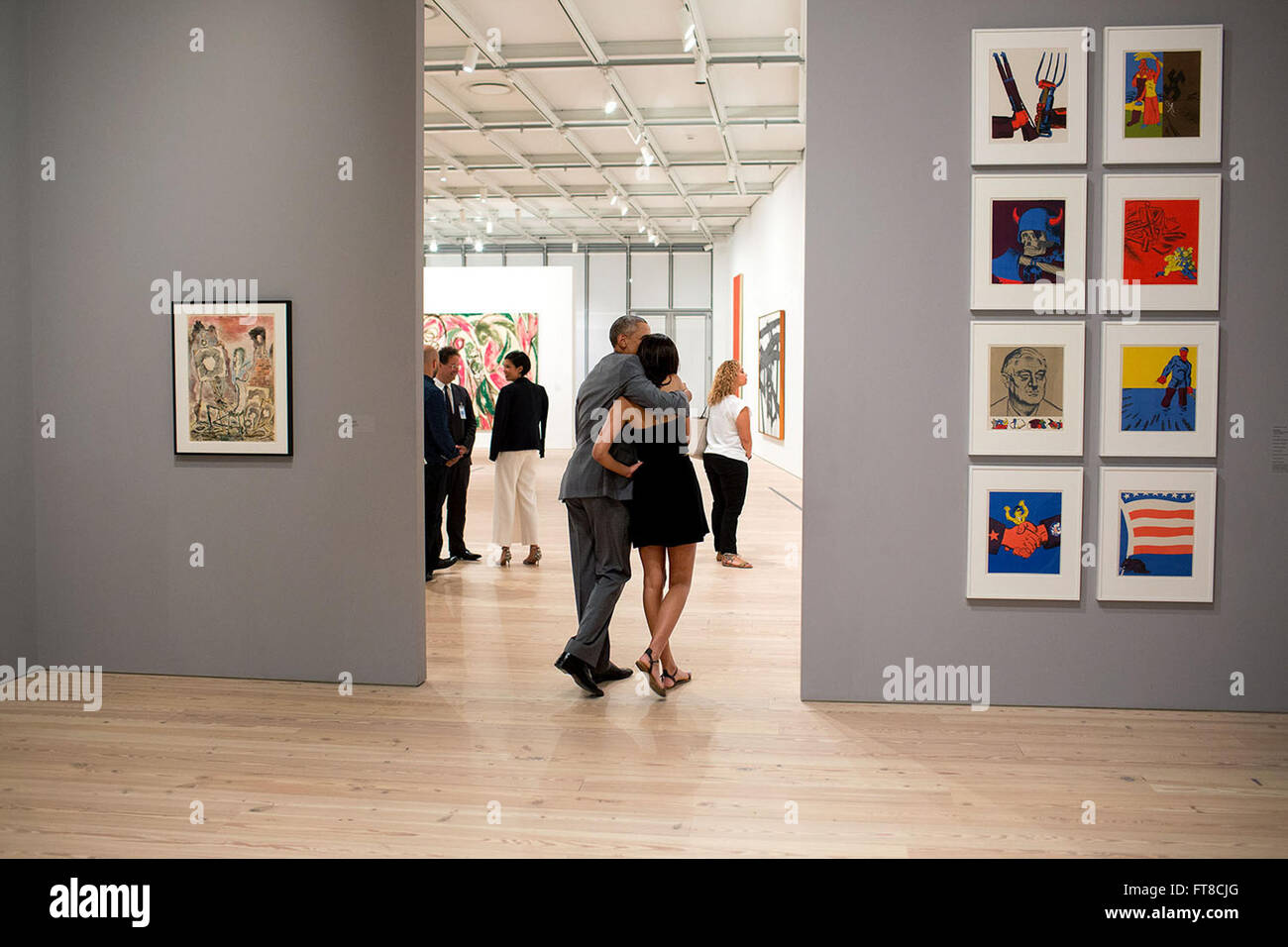 July 17, 2015 'While visiting the Whitney Museum in New York City, the President hugged his daughter Malia as they looked at the art work.' (Official White House Photo by Pete Souza) Stock Photo