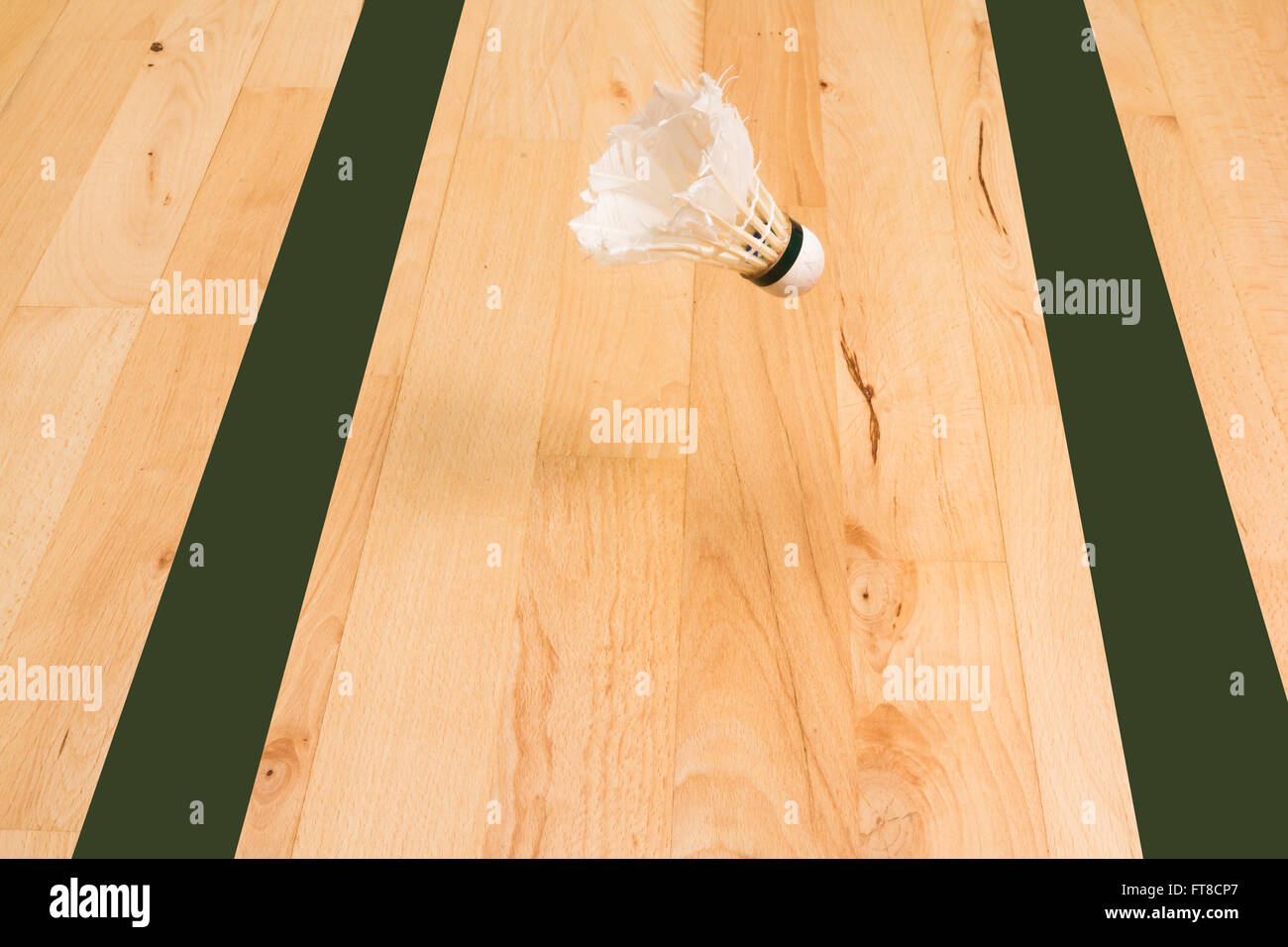 shuttlecock to land between the two outer green lines of a badminton court Stock Photo - Alamy