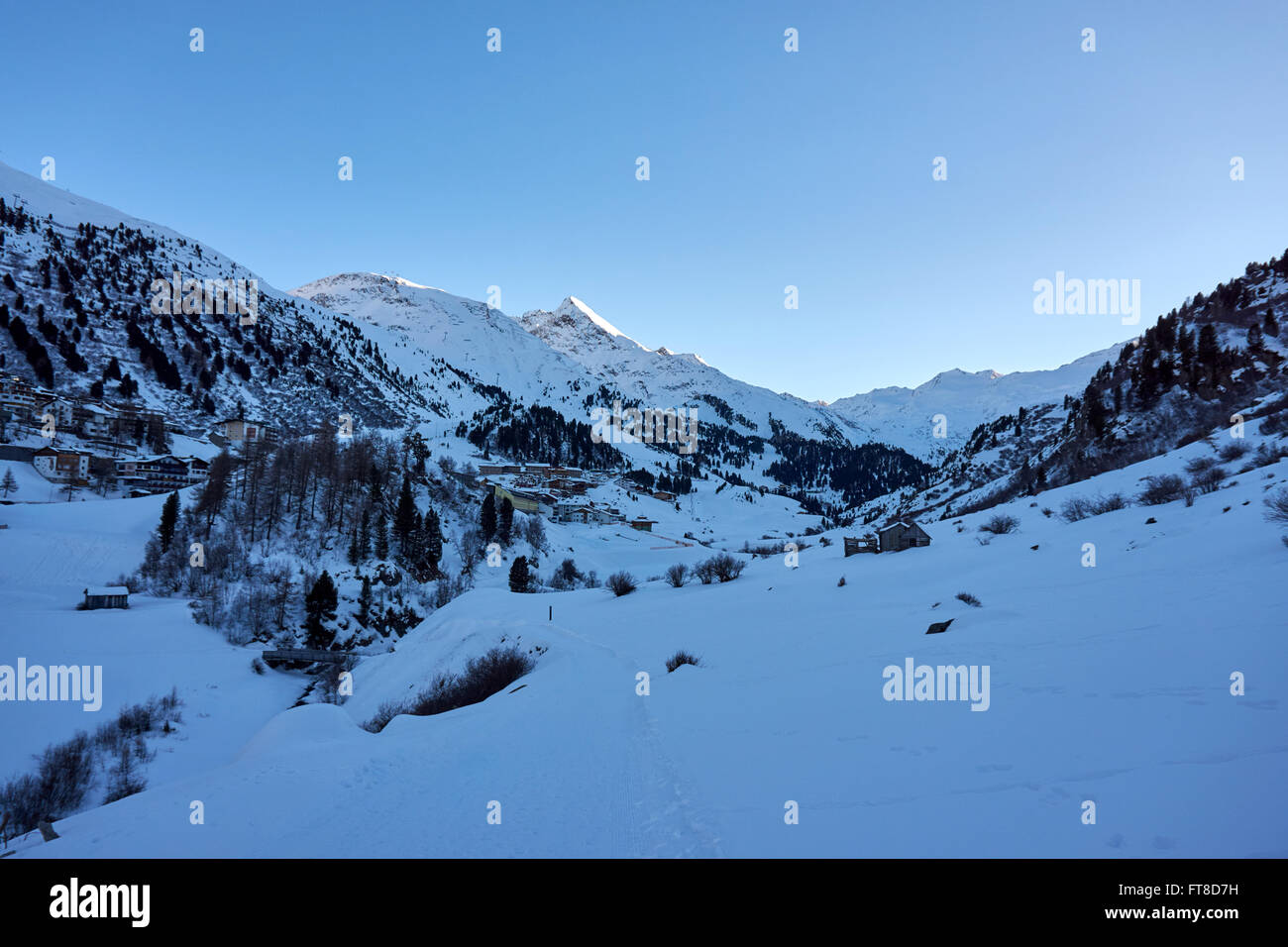 View towards the village of Obergurgl, Ötztal, Austria: late afternoon, winter Stock Photo