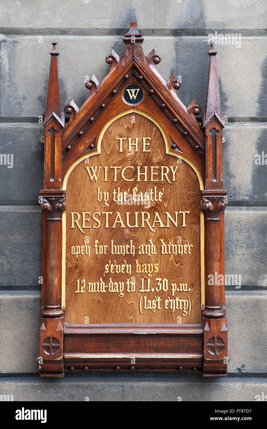 Edinburgh, City of Edinburgh, Scotland. Wooden plaque outside the Witchery restaurant, one of the city's most famous landmarks. Stock Photo