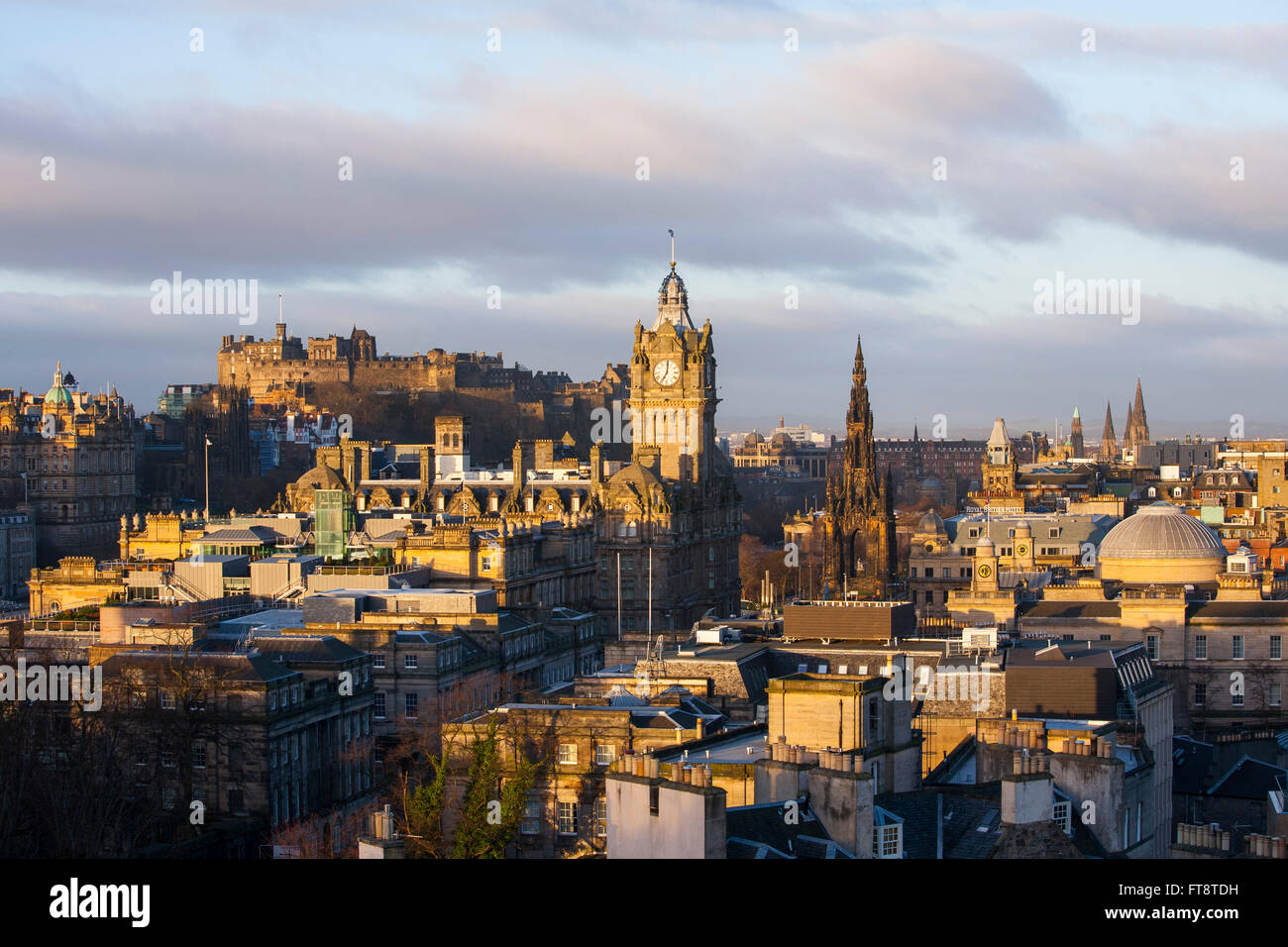Edinburgh, City of Edinburgh, Scotland. View of the city skyline from Calton Hill, sunrise, the Balmoral Hotel prominent. Stock Photo