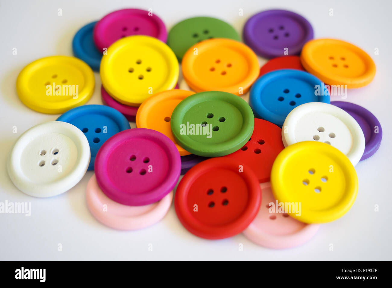 Buttons Bold Colors 2. A collection of boldly colored, painted wooden buttons. Stock Photo