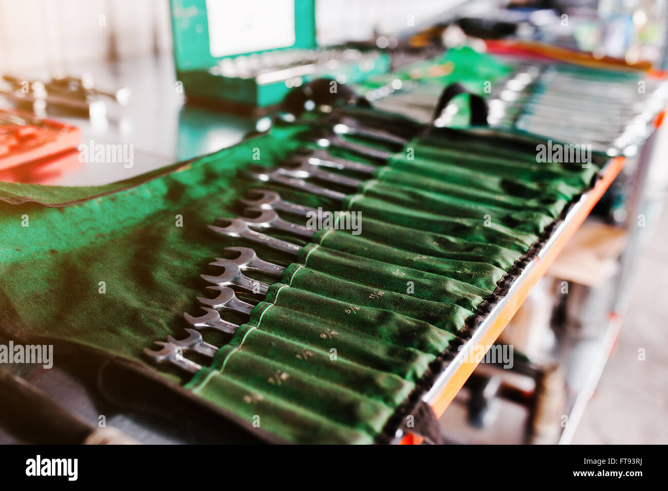 Metal rack with set of wrench spanners tools Stock Photo - Alamy