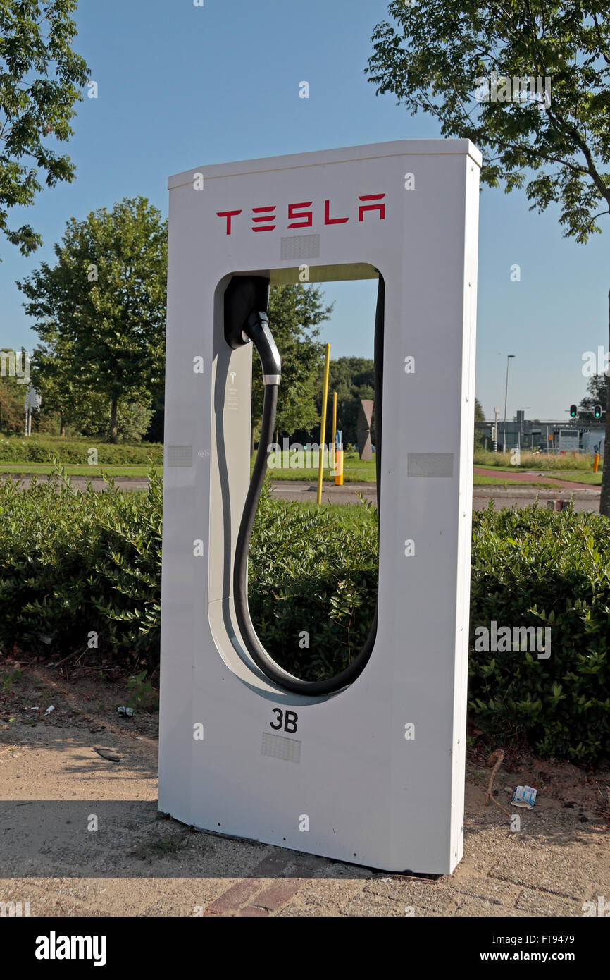 A Tesla charging (Supercharger) station in Zevenaar, Netherlands Stock
