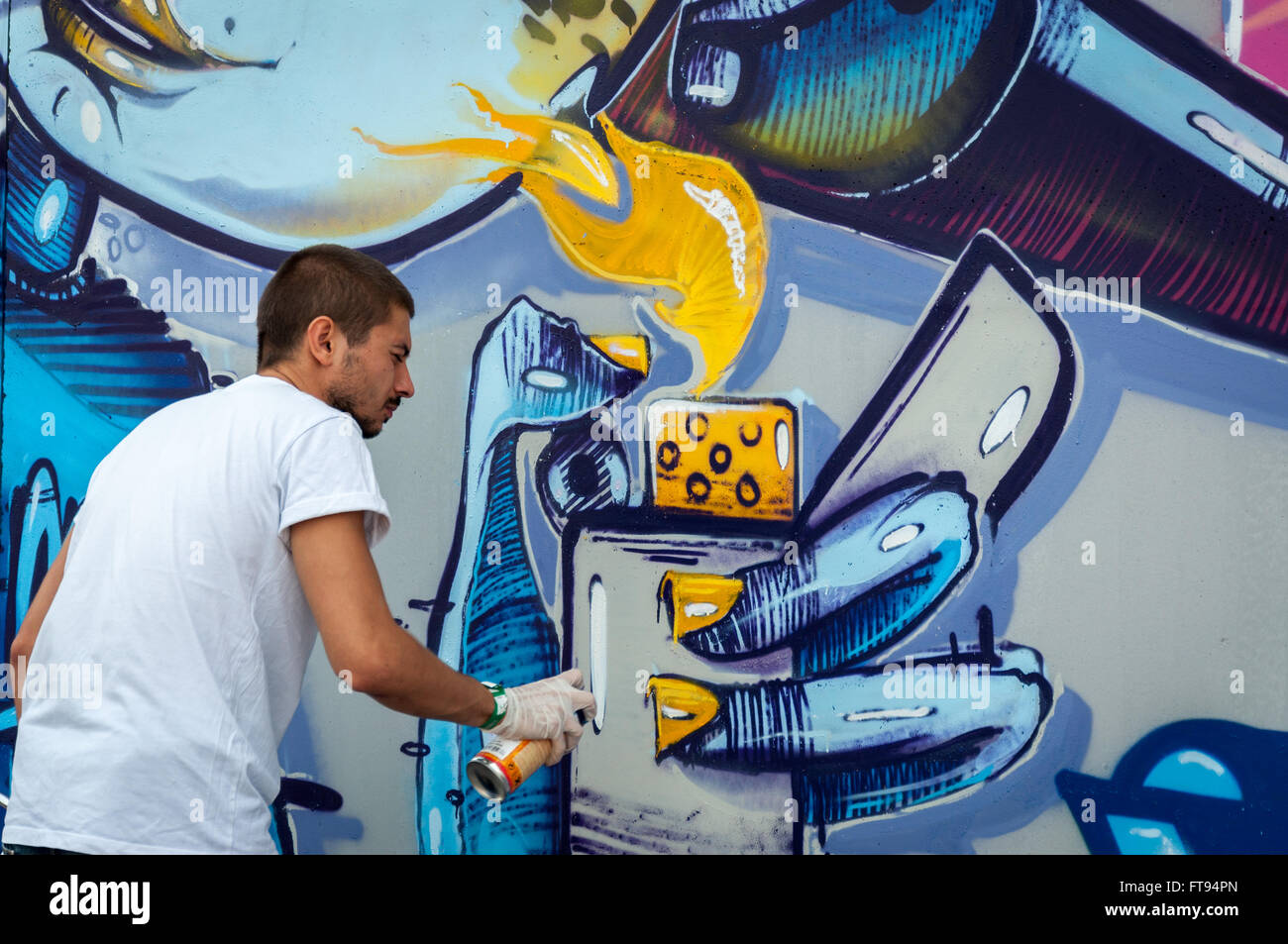 Artist painting graffiti Stock Photo