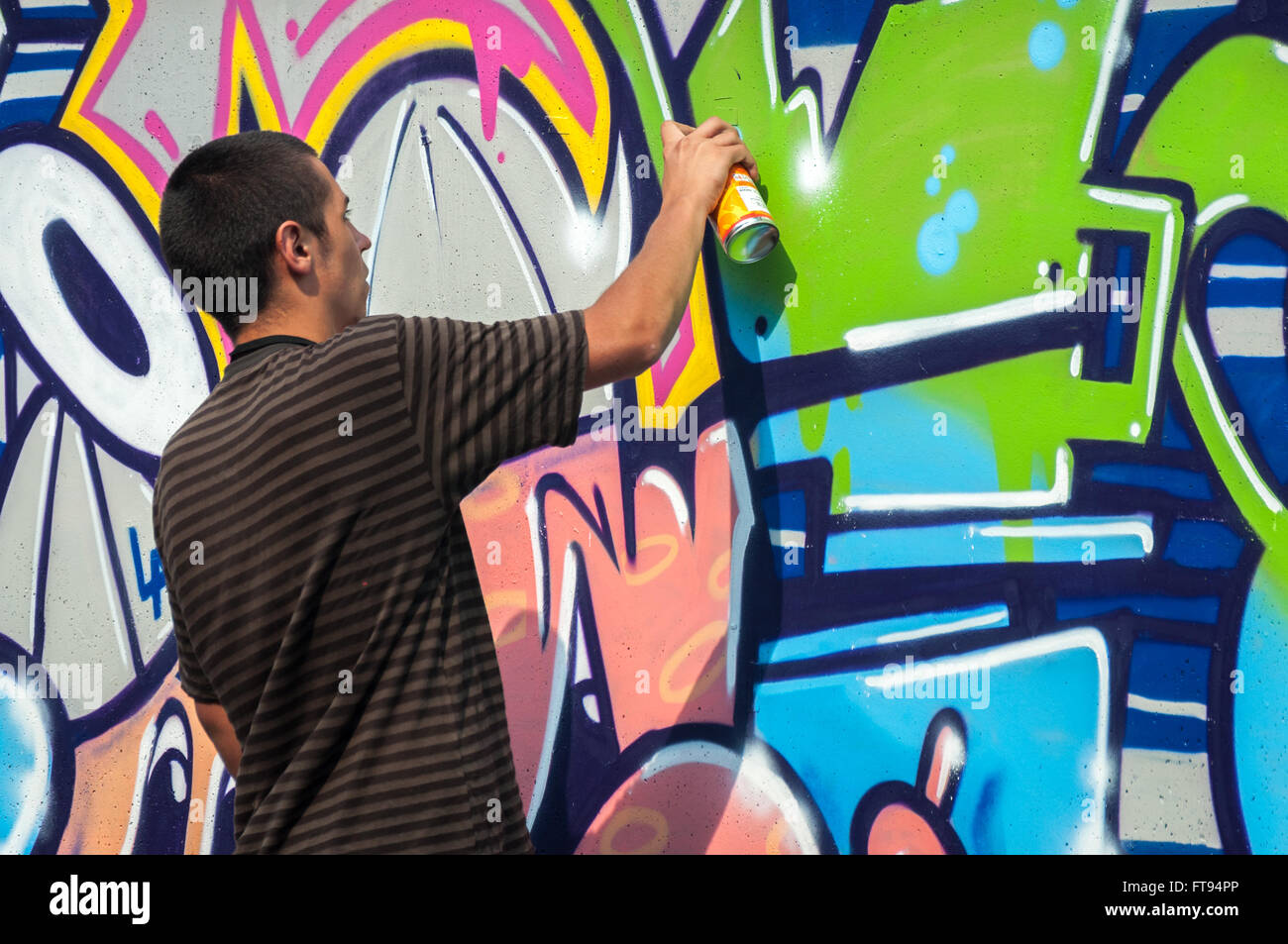 Artist painting graffiti Stock Photo Alamy