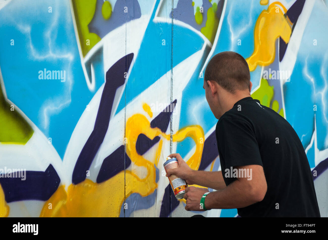 Artist painting graffiti Stock Photo Alamy