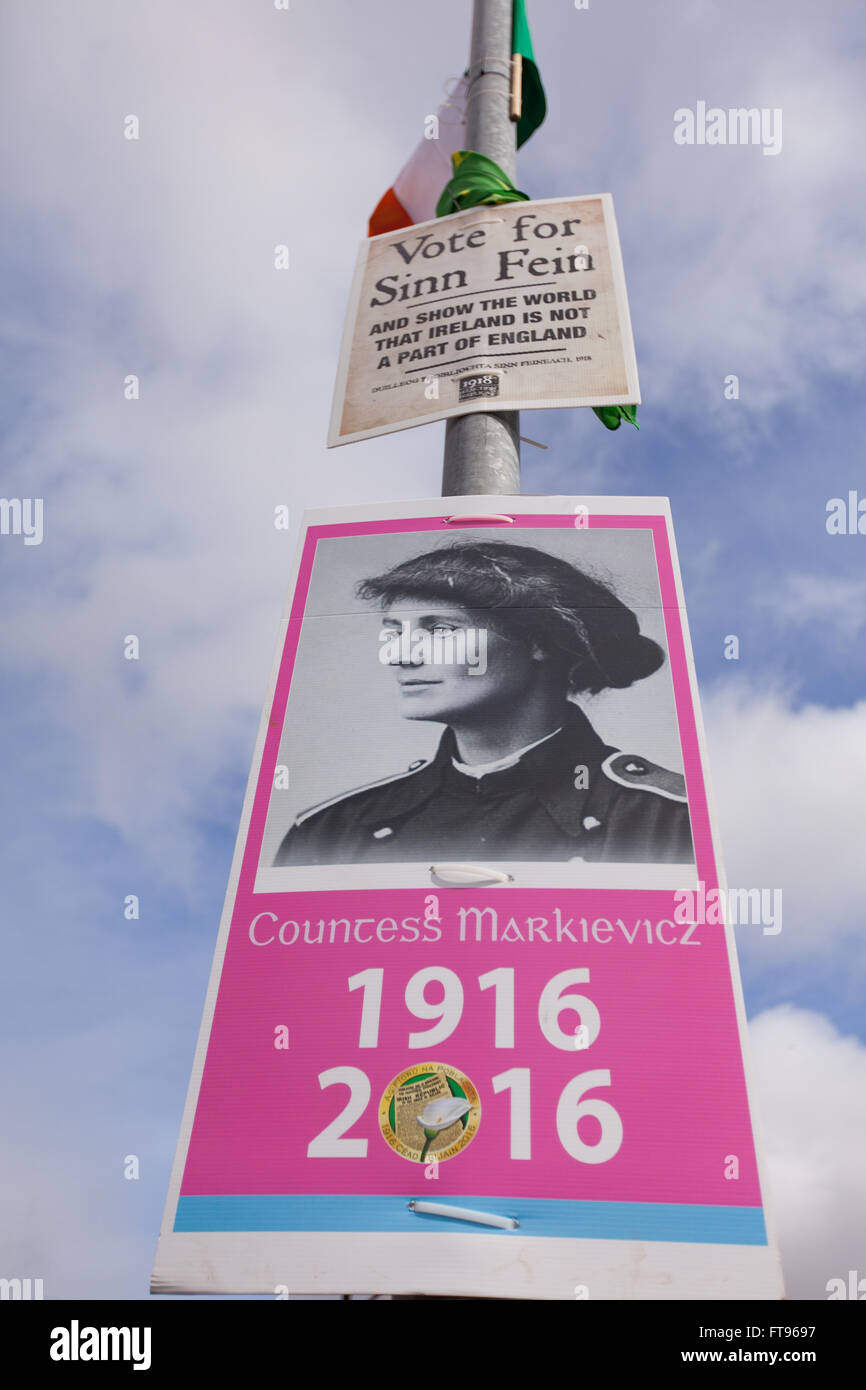 West Belfast, Ireland. 25th March, 2016. Countess Markievicz and Sinn Fein posters attached to a lamppost in West Belfast. Preparations to Commemorate the 100th Anniversary of the Easter Rising Credit:  Bonzo/Alamy Live News Stock Photo