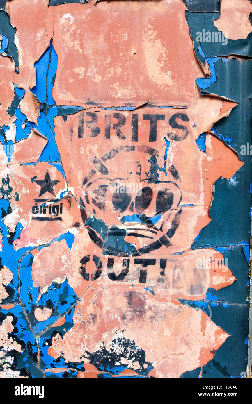 West Belfast, Ireland. 25th March, 2016. Brits Out Stenciled on a Wall in West Belfast. Preparations to Commemorate the 100th Anniversary of the Easter Rising Credit:  Bonzo/Alamy Live News Stock Photo