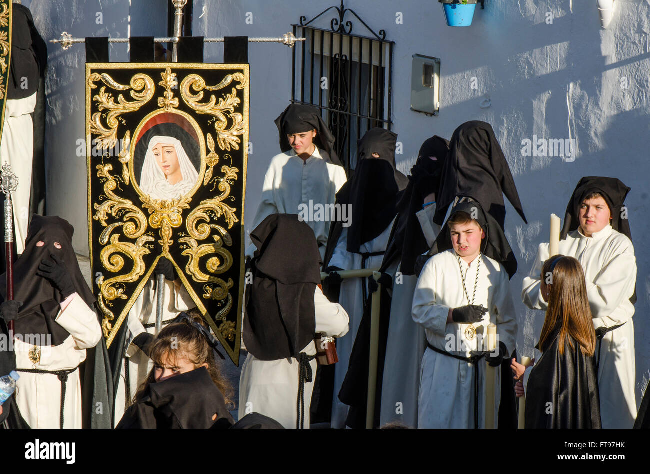 Mijas, Andalusia, Spain. 25 march 2016. Good Friday procession in Andalusian white village of Mijas, Children and teenagers participating. Malaga Province. Credit:  Perry van Munster/ Alamy Live News Stock Photo