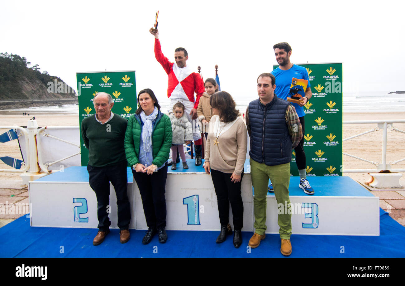 Ribadesella, Spain. 25th March, 2016. Raul Fragueiro (2nd), Luis Hermindio (1st) and David Blanco (3rd) at the podium of the second race of the horse race at Sta. Marina Beach on March 25, 2016 in Ribadesella, Spain. Credit:  David Gato/Alamy Live News Stock Photo