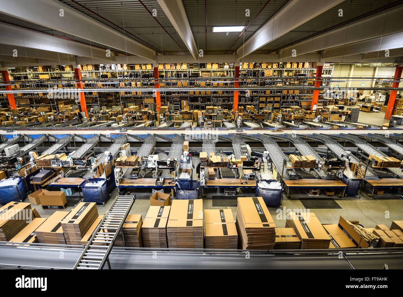Treppendorf, Germany. 24th Mar, 2016. Numerous boxes can be seen in a  warehouse at the Musikhaus Thomann in Treppendorf, Germany, 24 March 2016.  The Musikhaus Thomann has become one of the world's