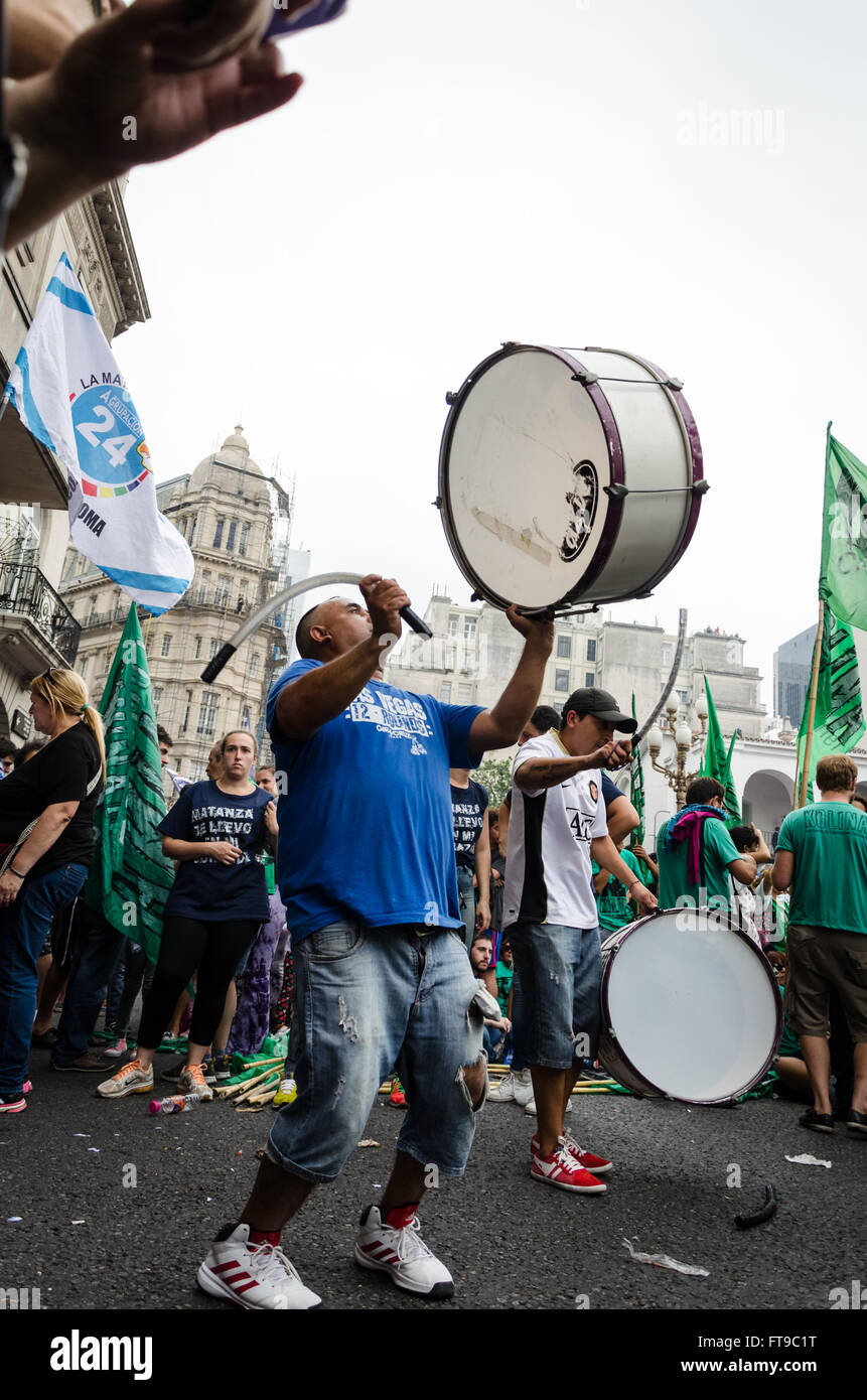 40th anniversary of military coup in Argentina -  24/03/2016  -  Argentina / Buenos Aires  -  A peronist militant drumming in march memory to 40 years into the military dictatorship.   -  Matias Izaguirre / Le Pictorium Stock Photo