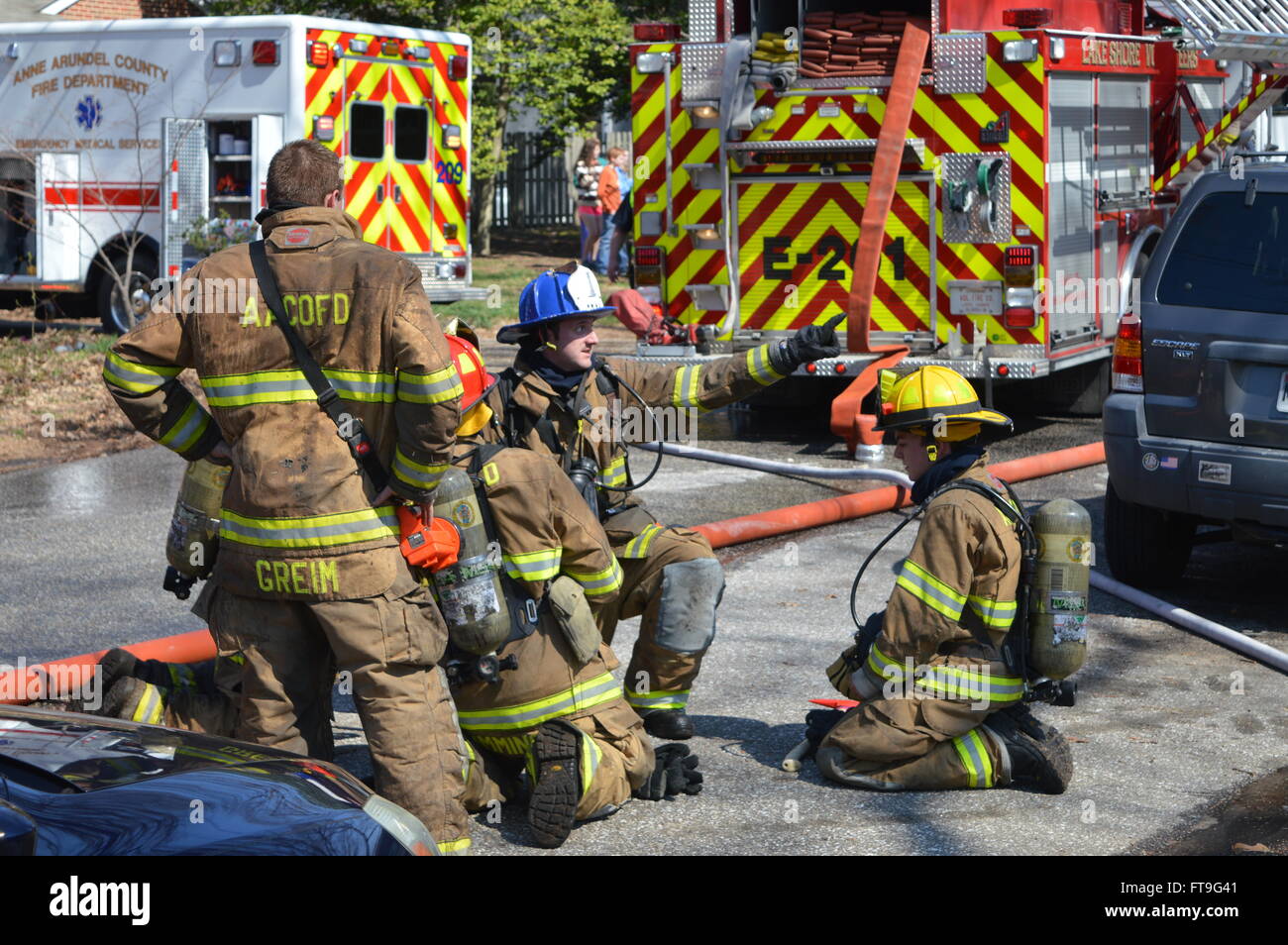 Fire Fighters - Pasadena, MD, US 3/26/16 House Fire Stock Photo