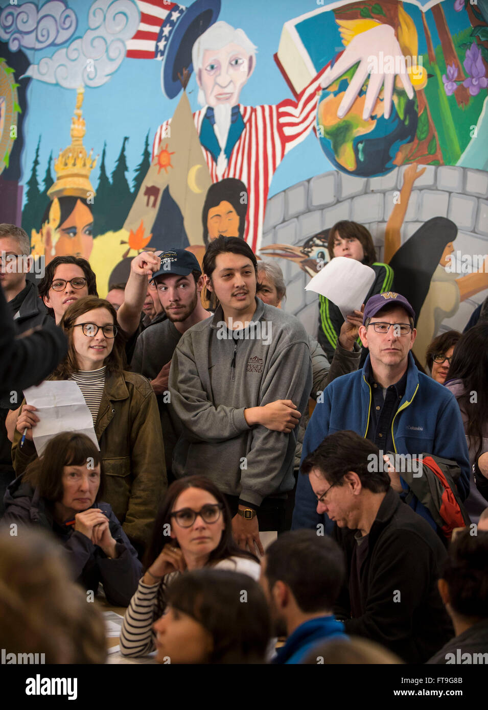 Seattle, Washington, USA. 26th Mar, 2016. With 118 delegates at stake for Hillary Clinton and Bernie Sanders, voters participate in Washington state's Democratic caucuses at Eckstein Middle School. Credit:  Brian Cahn/ZUMA Wire/Alamy Live News Stock Photo