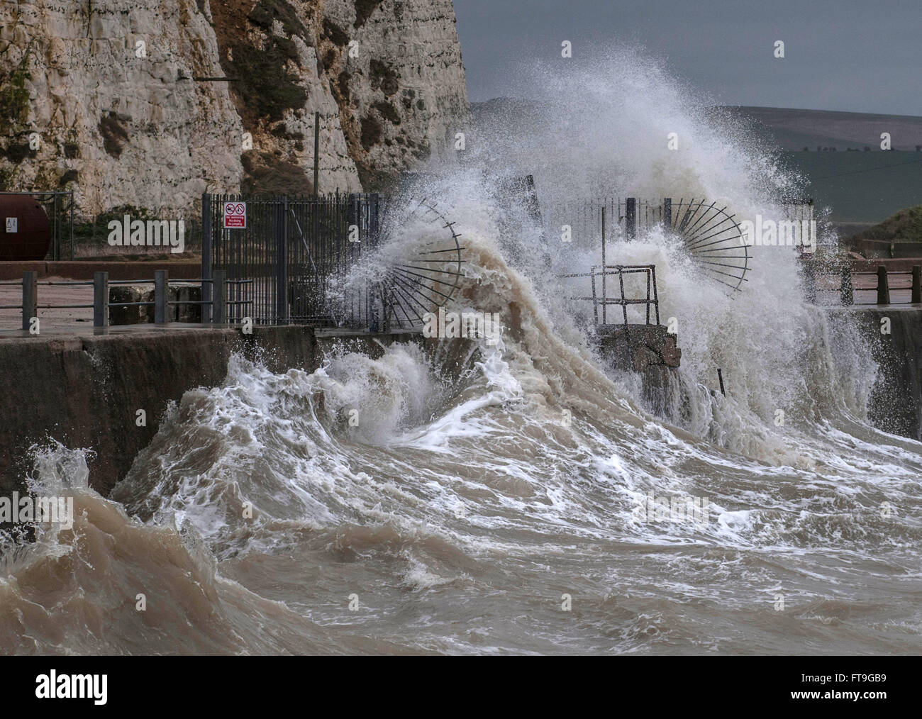 Newhaven, East Sussex, UK. 26 March 2016. Storm force wind from the South whips up the sea in harbour entrance. Stock Photo
