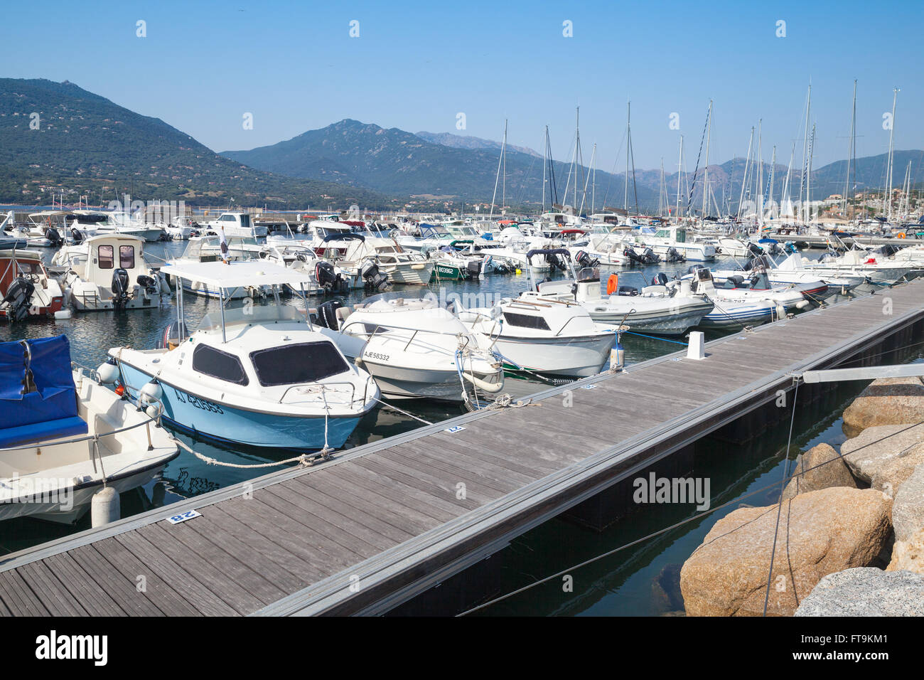 Propriano, France - July 3, 2015: Marina of Propriano town, South region of Corsica island, France. Luxury pleasure motor boats Stock Photo