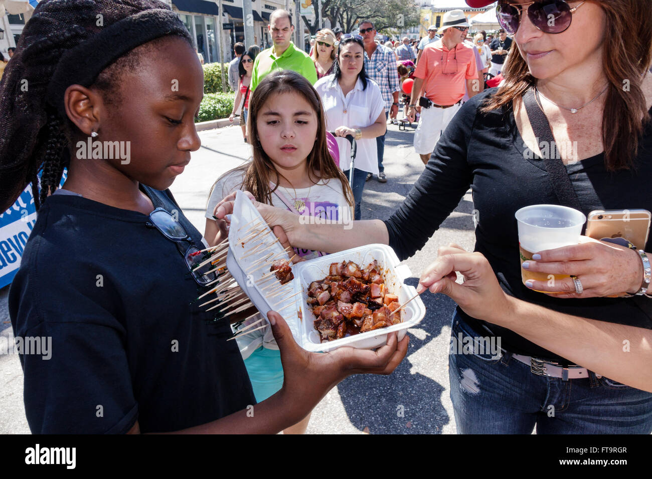 Miami Florida,Coral Gables,Carnaval Carnival Miracle Mile,street festival,annual celebration,Hispanic Black African Africans,girl girls,youngster,fema Stock Photo