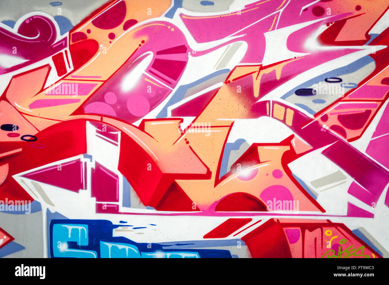 Colorful painted graffiti mural wall. Abstract background. Stock Photo