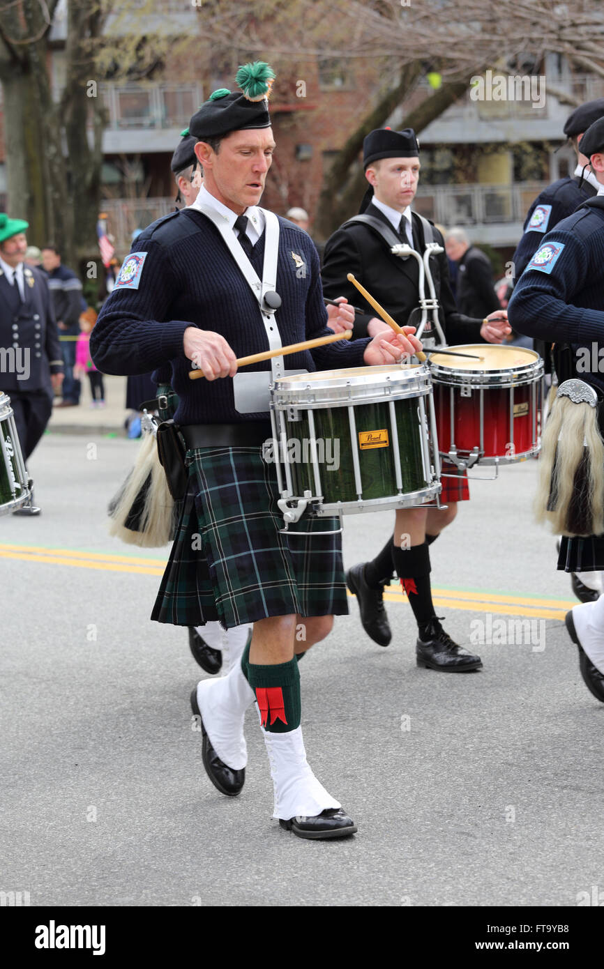 Pipes and Drums band marching in St. Patrick's Day parade Yonkers New York Stock Photo