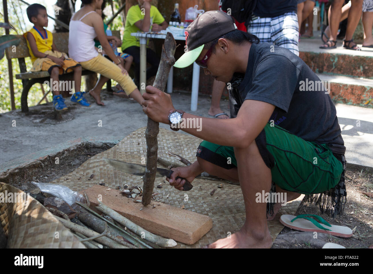 The chopping of traditional herbs and plants collected by Healers during the annual Holy Week Healing Festival held on Siquijor Stock Photo
