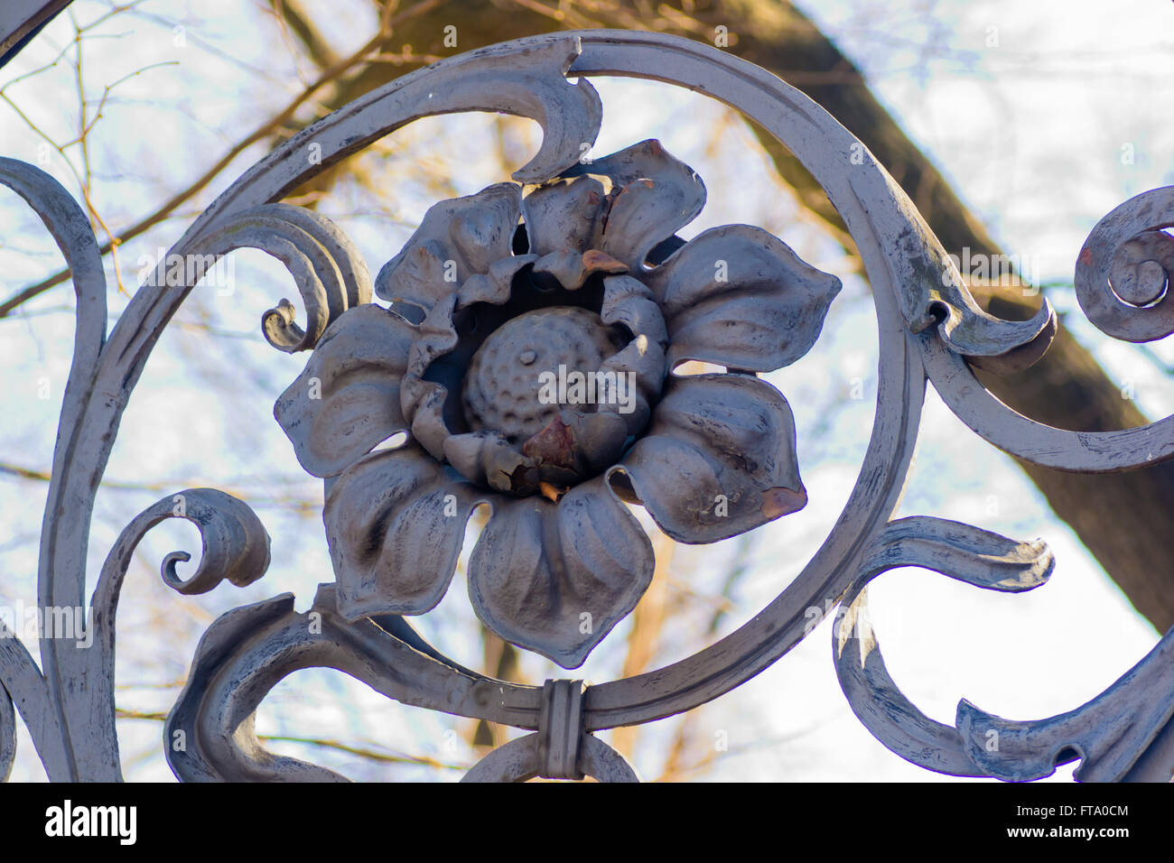 gold iron fence in the center of the old city Stock Photo