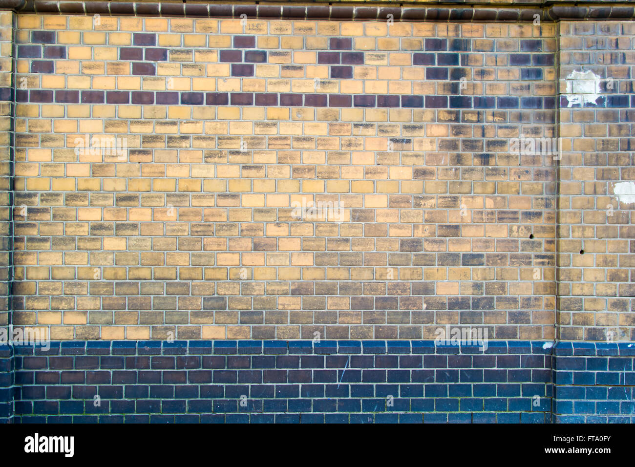 the brick wall in the centre of the old Stock Photo