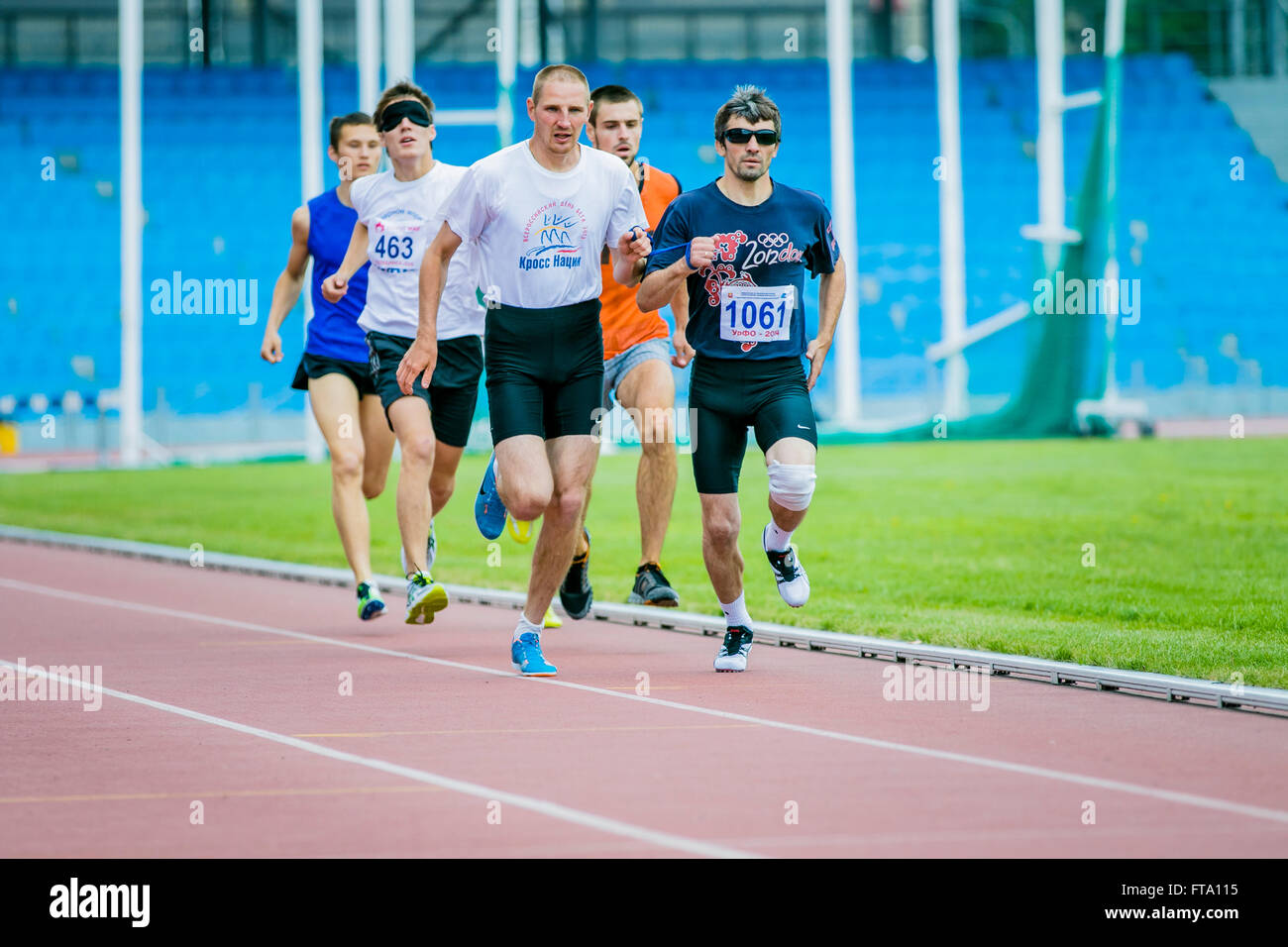 Chelyabinsk, Russia - July 05, 2015: blind men athletes run 800 meters during Championship Russia on track and field athletics Stock Photo