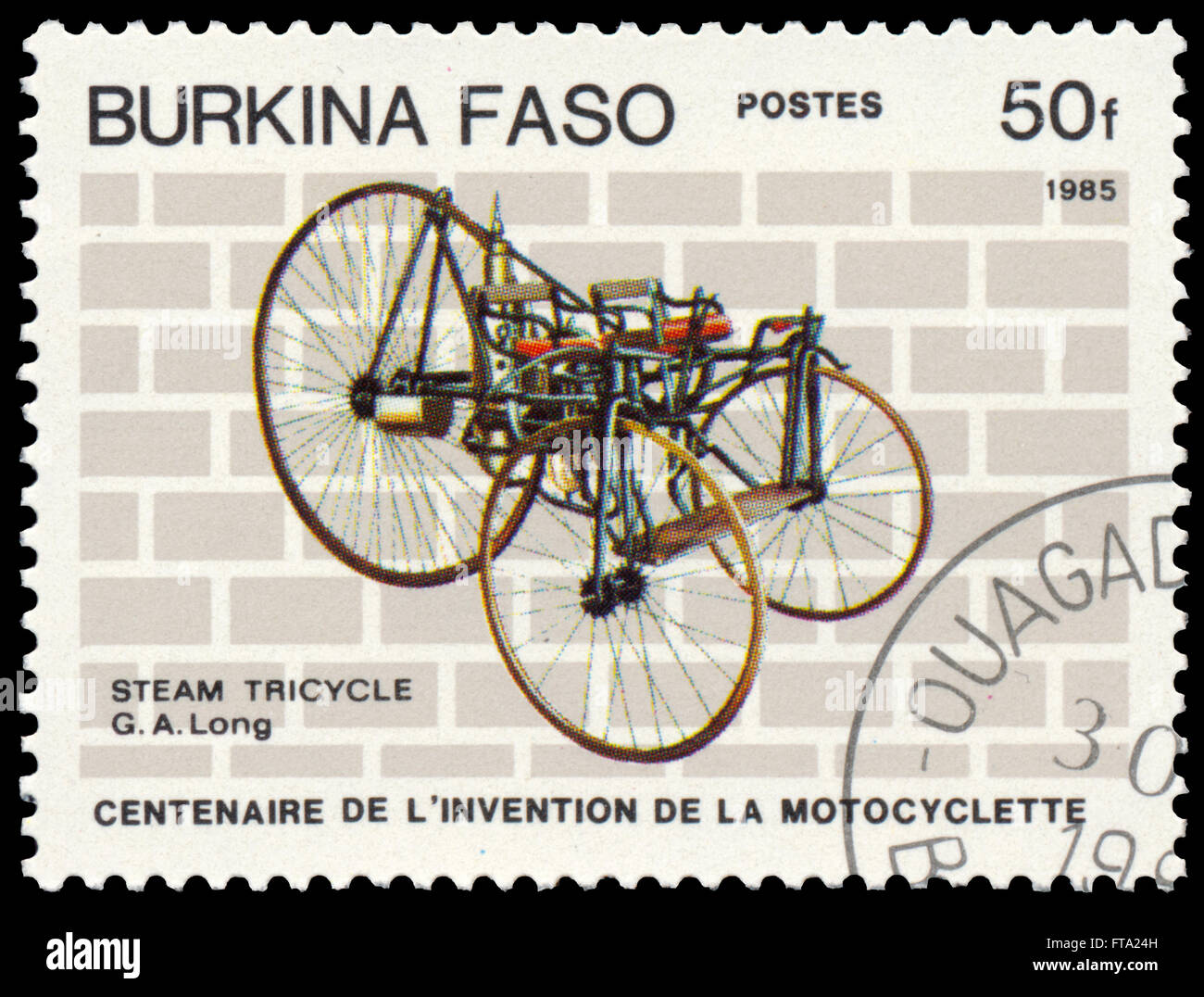 BUDAPEST, HUNGARY - 18 march 2016:  a stamp printed in Burkina Faso shows image of a vintage motorcycle, Stem Tricycle, G.A. Lon Stock Photo