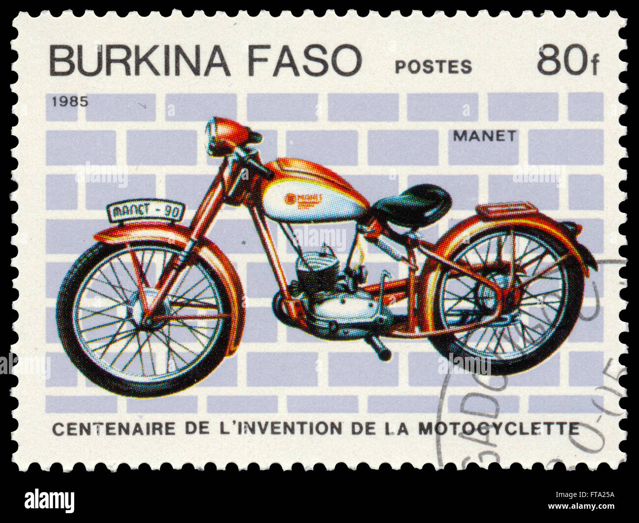 BUDAPEST, HUNGARY - 18 march 2016:  a stamp printed in Burkina Faso shows image of a vintage motorcycle, Manet, circa 1985 Stock Photo