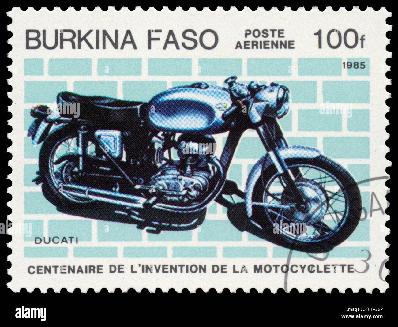 BUDAPEST, HUNGARY - 18 march 2016:  a stamp printed in Burkina Faso shows image of a vintage motorcycle, Ducati, circa 1985 Stock Photo