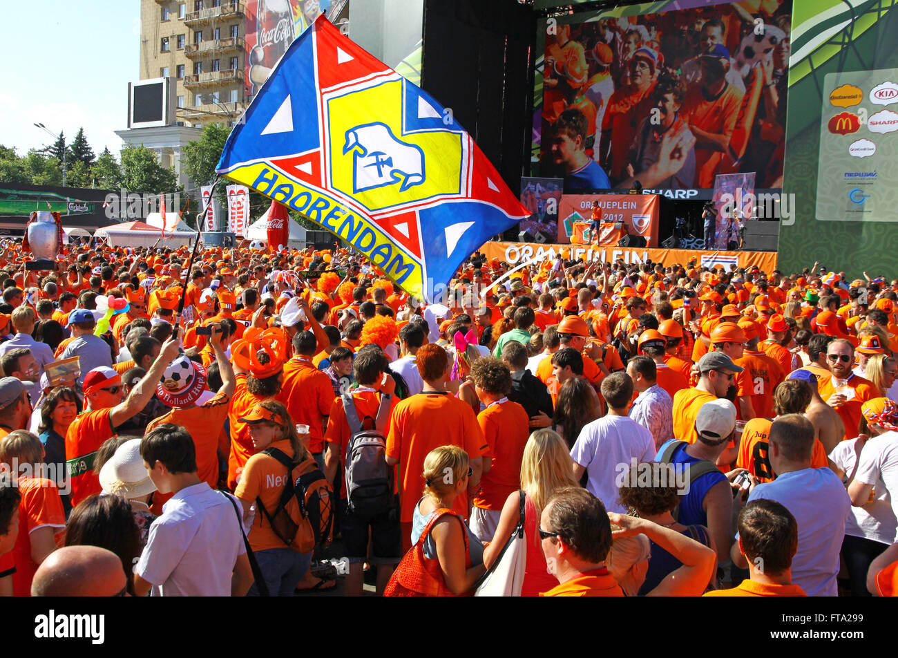 KHARKIV, UKRAINE - 13 June, 2012: Holland football team supporters walk on a street of Kharkiv city before UEFA EURO 2012 game against Germany on 13 June, 2012 in Kharkiv, Ukraine Stock Photo